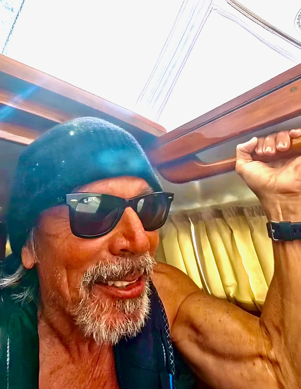 Rufus at the helm below decks, underway toward Portugal
